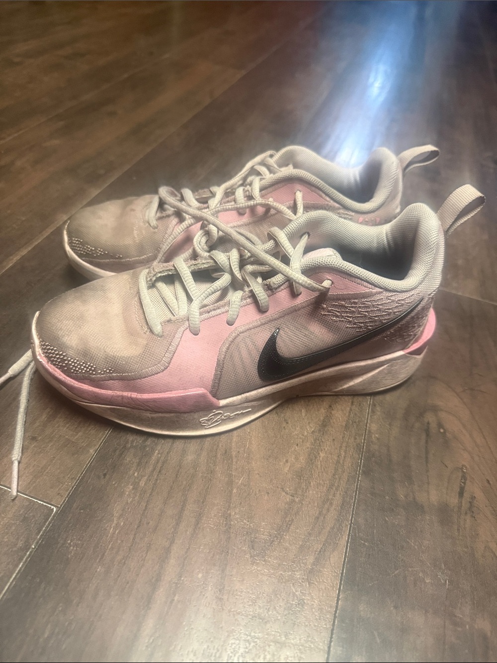 Nike Kids Pink and Gray Athletic Sneakers with Black Swoosh